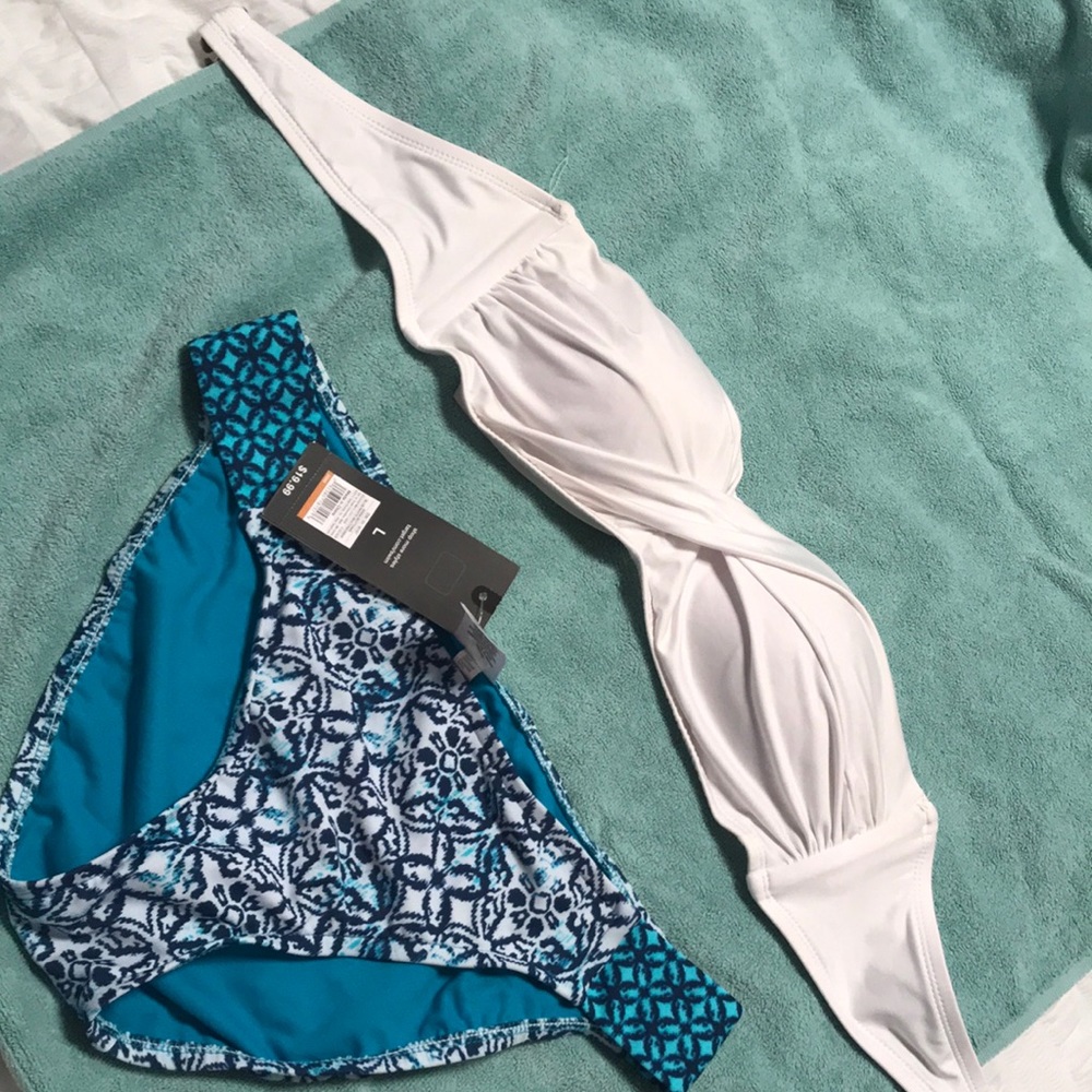 swim size L bot tags on. Top worn and size M.